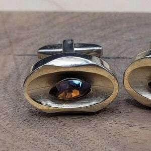 Mid Century Brass Tone Oval Cufflink Wirh Amber Colored Glass